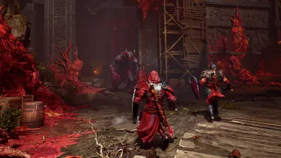 Two player characters facing a large demon in Crimson Moon